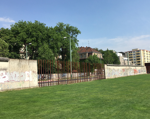 A section of the Berlin Wall standing in the Berlin Wall Memorial.